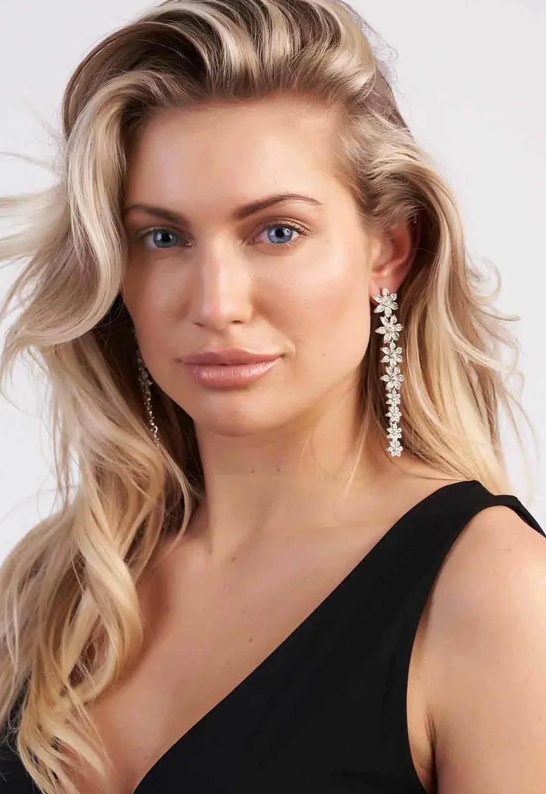 Always Chic Long Silver Floral Earrings - Image 3