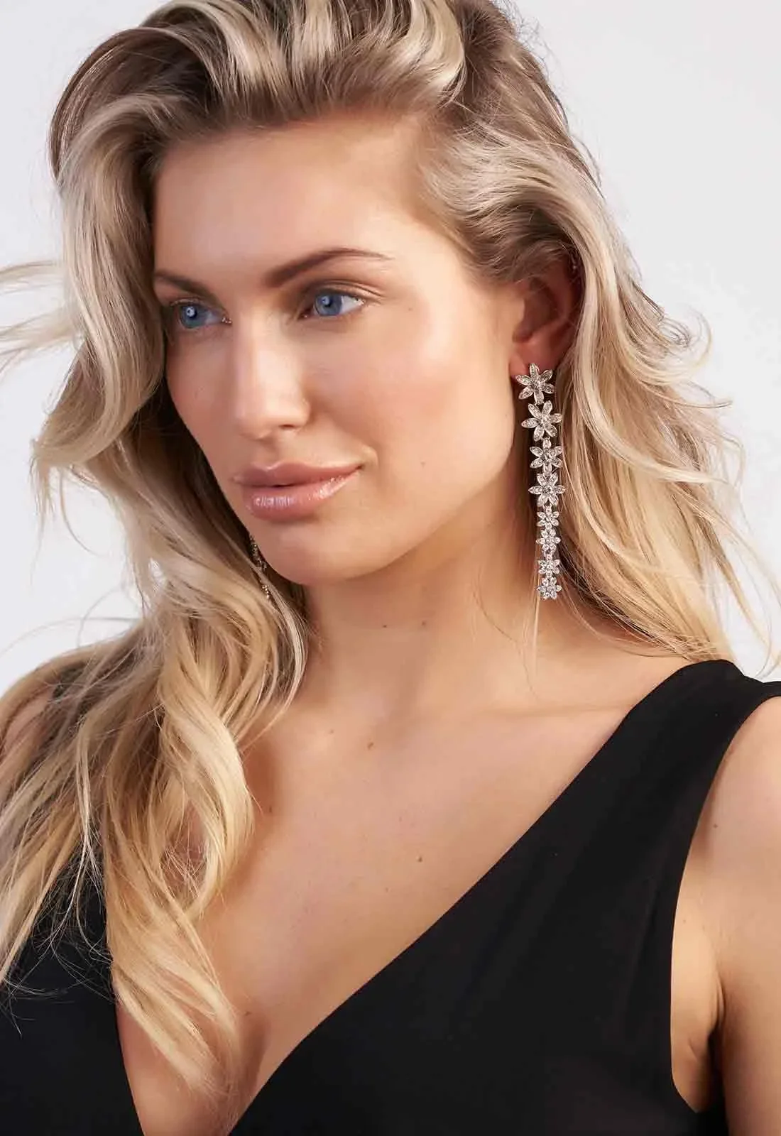Always Chic Long Silver Floral Earrings - Image 4