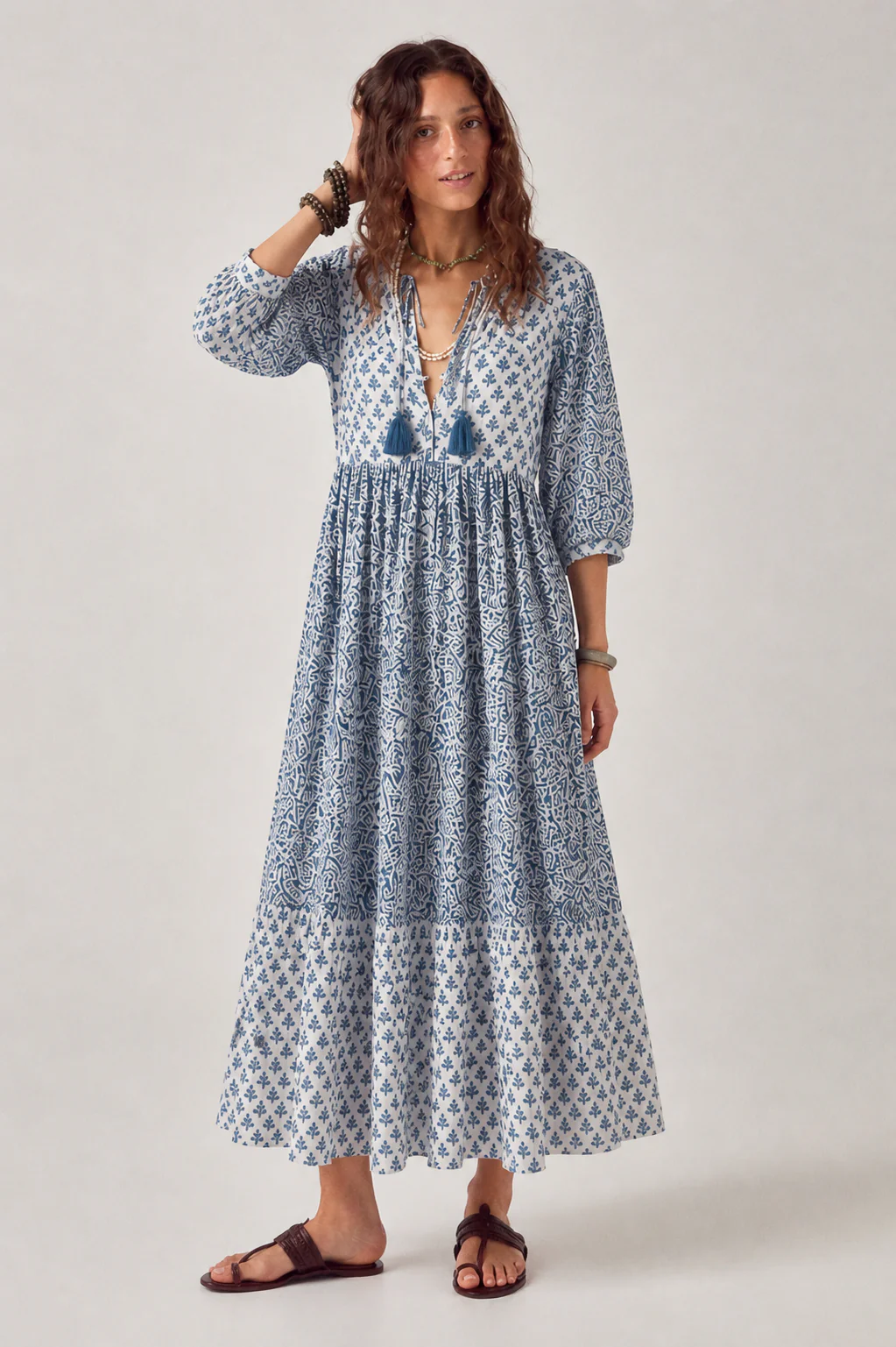 Woodblock printed Cotton Voile dress in blue and white print with button bodice with ties.